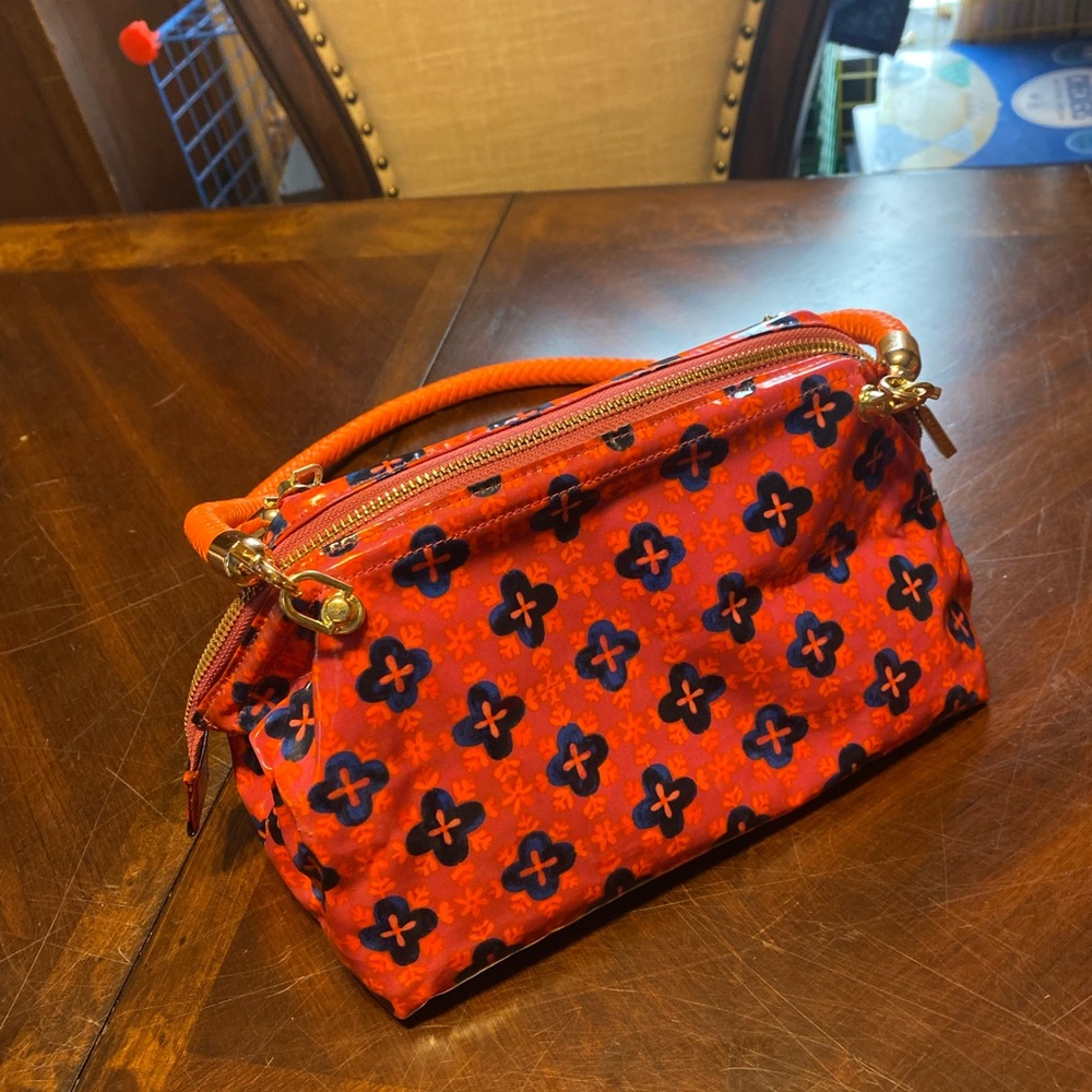 Tory Burch Red-Orange Floral Crossbody Wristlet with Navy Accents - Picture 12 of 16